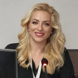 	Πολυξένη Μαγγούλια